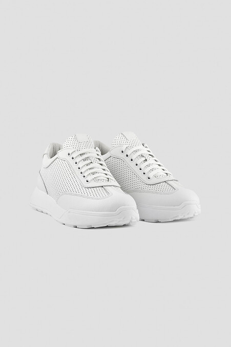 Classic white perforated women's sneakers made of genuine leather - #4205848