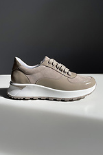 Stylish women's beige sneakers with lacquer inserts. - #4206094